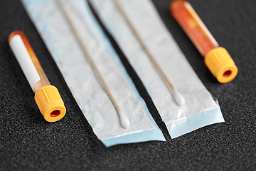 Image showing test tubes with blood plasma and cotton swabs