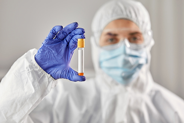 Image showing scientist in protective mask with test tube