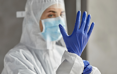 Image showing doctor in protective wear, mask and face shield