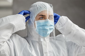 Image showing doctor in protective wear, mask and face shield