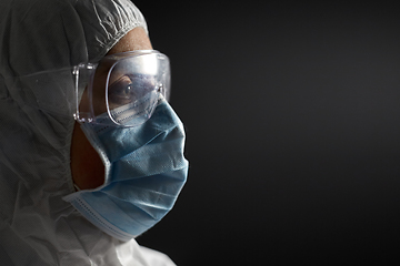 Image showing doctor in protective wear, face mask and goggles