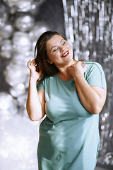 Image showing Portrait of the playful plus size model