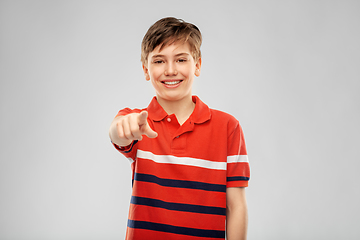 Image showing portrait of smiling boy pointing finger to camera