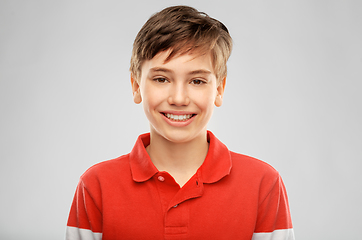 Image showing portrait of happy smiling boy in red polo t-shirt