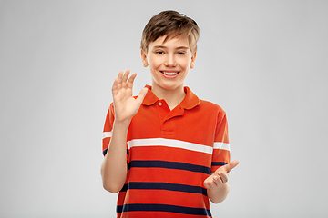 Image showing portrait of happy smiling boy applauding