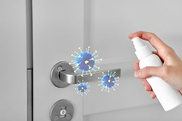 Image showing sanitizer spray kills coronavirus on door handle