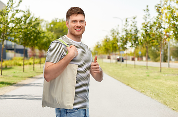 Image showing man with reusable canvas bag for food shopping