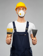 Image showing male worker or builder in helmet and respirator