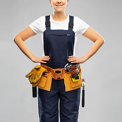 Image showing female worker or builder with working tools