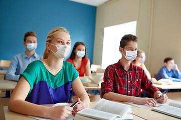 Image showing group of students in masks at school lesson