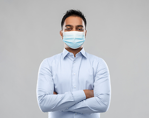 Image showing indian businessman in mask over grey background