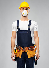 Image showing male worker or builder in helmet and respirator