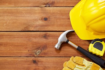 Image showing different work tools on wooden boards