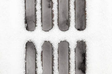 Image showing Grate under snow