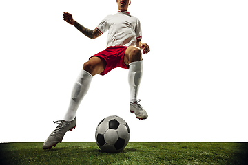 Image showing Football or soccer player on white background - motion, action, activity concept