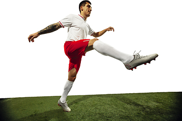 Image showing Football or soccer player on white background - motion, action, activity concept