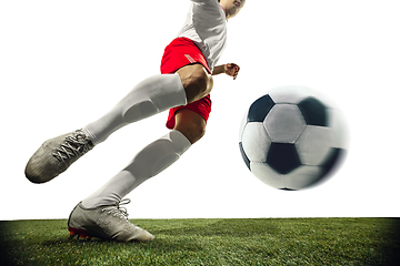 Image showing Football or soccer player on white background - motion, action, activity concept