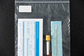 Image showing beaker with test, cotton swab and medical report