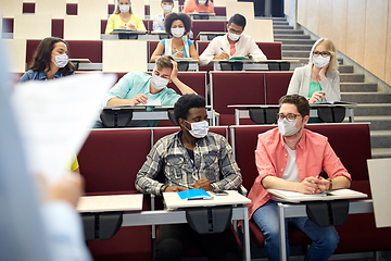 Image showing group of students in masks at lecture hall