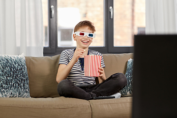 Image showing boy in 3d movie glasses and watching tv at home