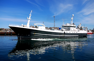 Image showing Fishing Boat Leaving Port