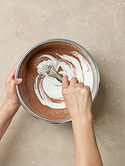 Image showing chocolate cake dough making process