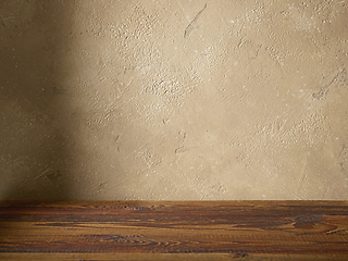 Image showing beige color wall and wooden table