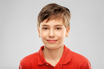 Image showing portrait of happy smiling boy in red polo t-shirt