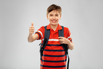 Image showing happy student boy with backpack showing thumbs up