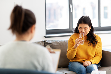 Image showing young asian woman patient and psychologist