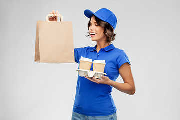 Image showing delivery woman with takeaway food and drinks