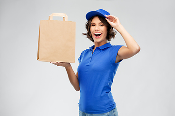 Image showing delivery woman with takeaway food in paper bag