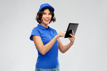 Image showing happy smiling delivery girl with tablet computer