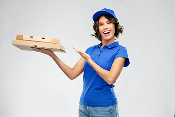 Image showing delivery woman with takeaway pizza boxes