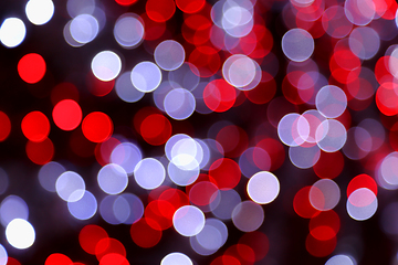 Image showing Bright unfocused holiday color lights