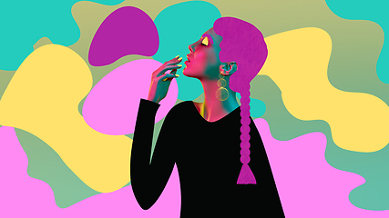 Image showing Portrait of a beautiful young woman with bright colorful painted design