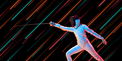 Image showing Creative sport and neon lines on dark background, flyer, proposal