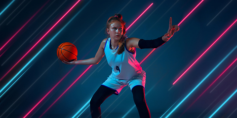 Image showing Creative sport and neon lines on dark background, flyer, proposal