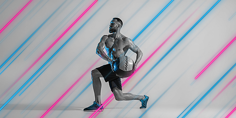 Image showing Creative sport and neon lines on grey background, flyer, proposal