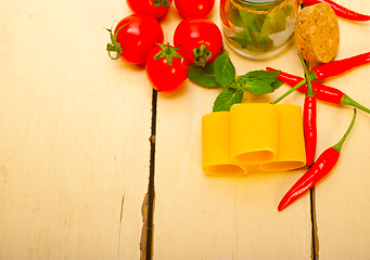 Image showing Italian pasta paccheri with tomato mint and chili pepper