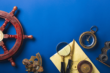 Image showing Old fashioned flat lay with retro accessories on blue background