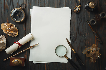 Image showing Old fashioned flat lay with letters writing accessories on dark wooden background