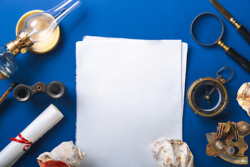 Image showing Old fashioned flat lay with retro accessories on blue background