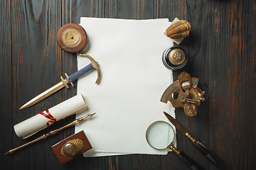 Image showing Old fashioned flat lay with letters writing accessories on dark wooden background