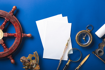 Image showing Old fashioned flat lay with retro accessories on blue background