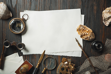 Image showing Old fashioned flat lay with letters writing accessories on dark wooden background