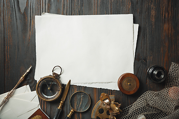 Image showing Old fashioned flat lay with letters writing accessories on dark wooden background