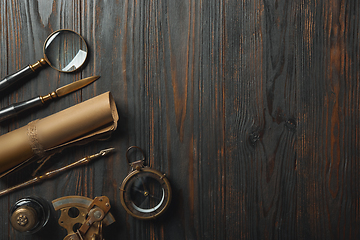 Image showing Old fashioned flat lay with letters writing accessories on dark wooden background