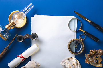 Image showing Old fashioned flat lay with retro accessories on blue background