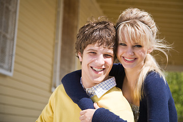 Image showing Caucasian couple in front of house
